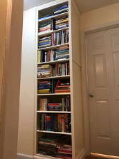 image shows a simple, functional, and modular design that can be used as a bookshelf